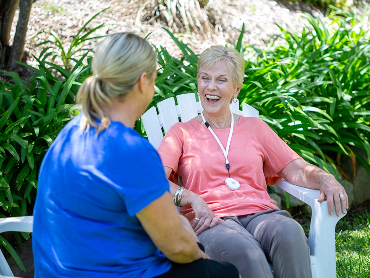 Senior wearing LiveLife SOS pendant alarm