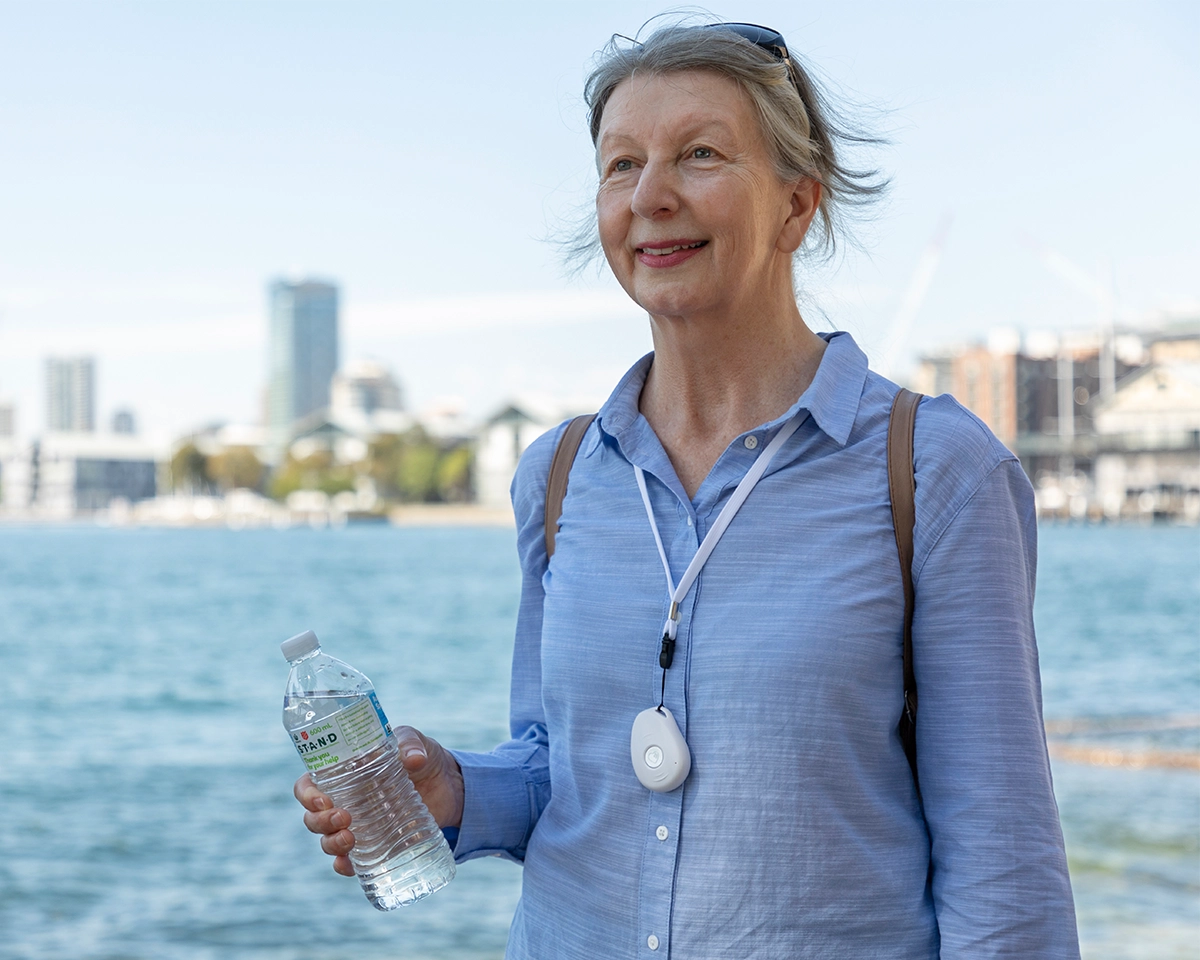 Senior with family member, living independently with confidence