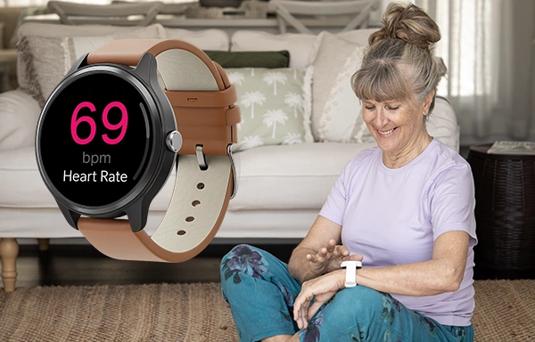 Active senior doing yoga wearing LiveLife watch alarm