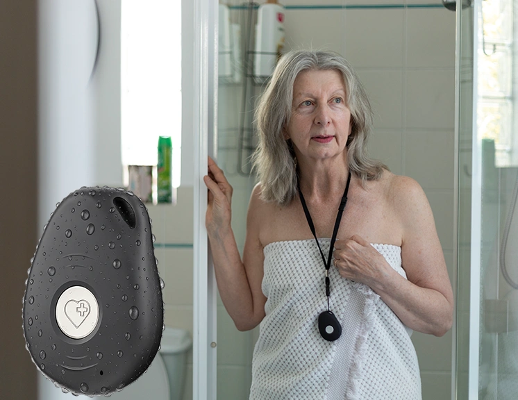 Woman wearing LiveLife Pendant in shower demonstrating IP67 waterproof protection