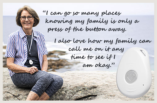 An elderly australian mum looking at the camera, wearing her LiveLife alarm for personal safety